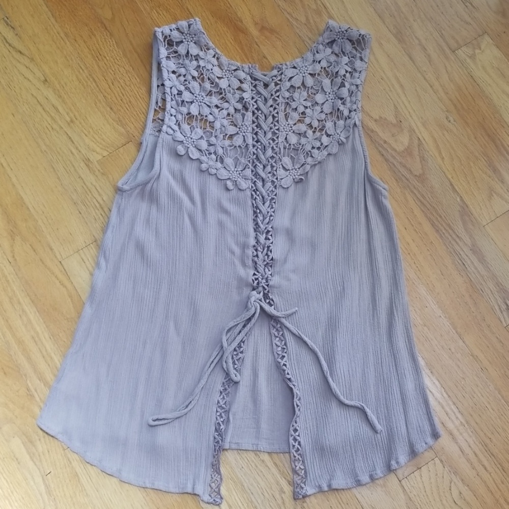 Unique sleeveless top with lace up back. - Picture 2 of 8